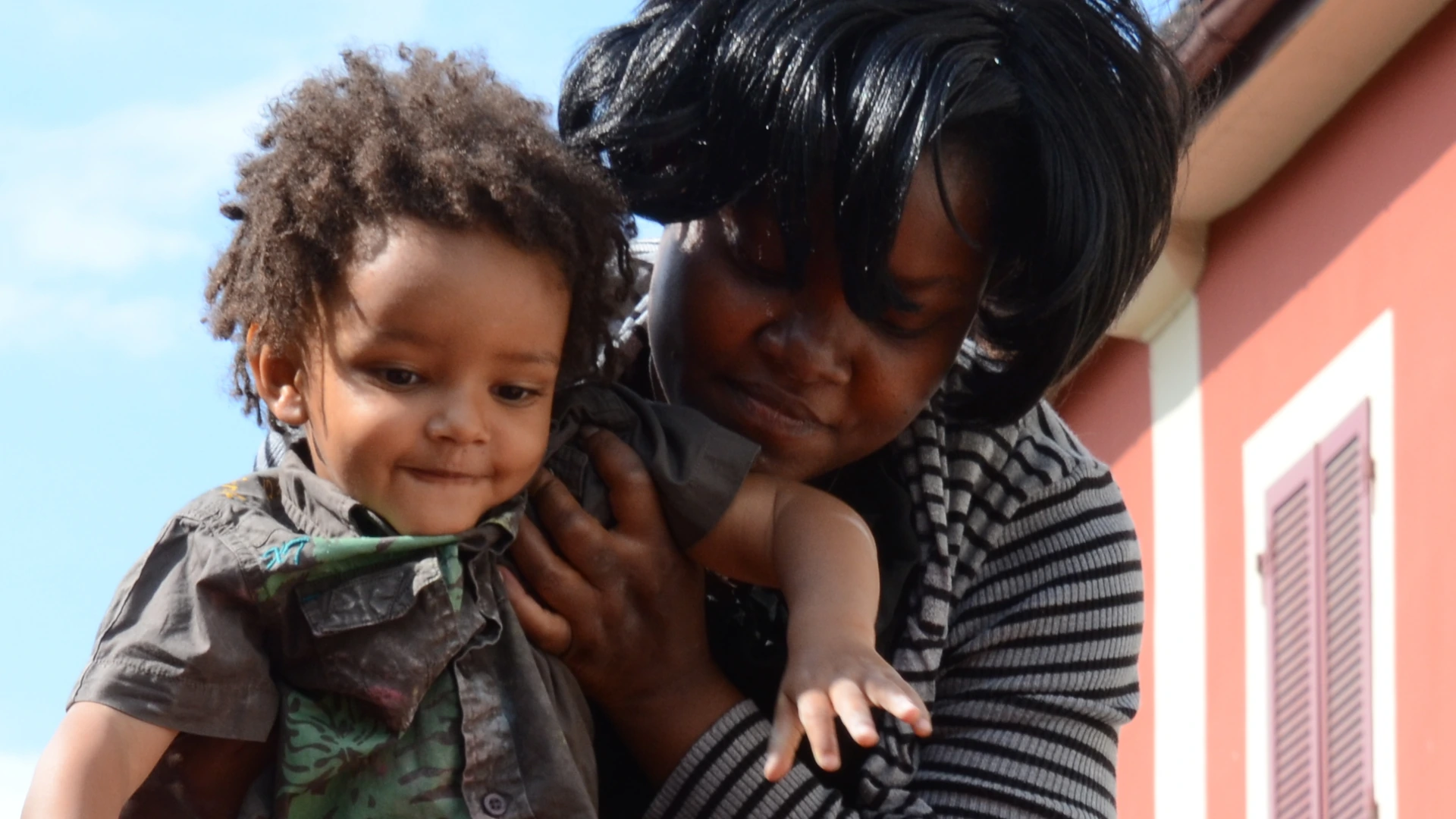 Afj Concept Socio-éducatif - une maman avec son enfant